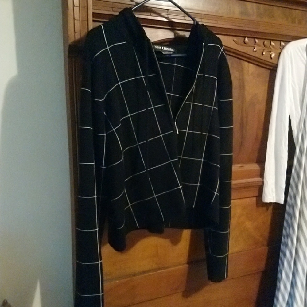 Black jacket with hood that zips up